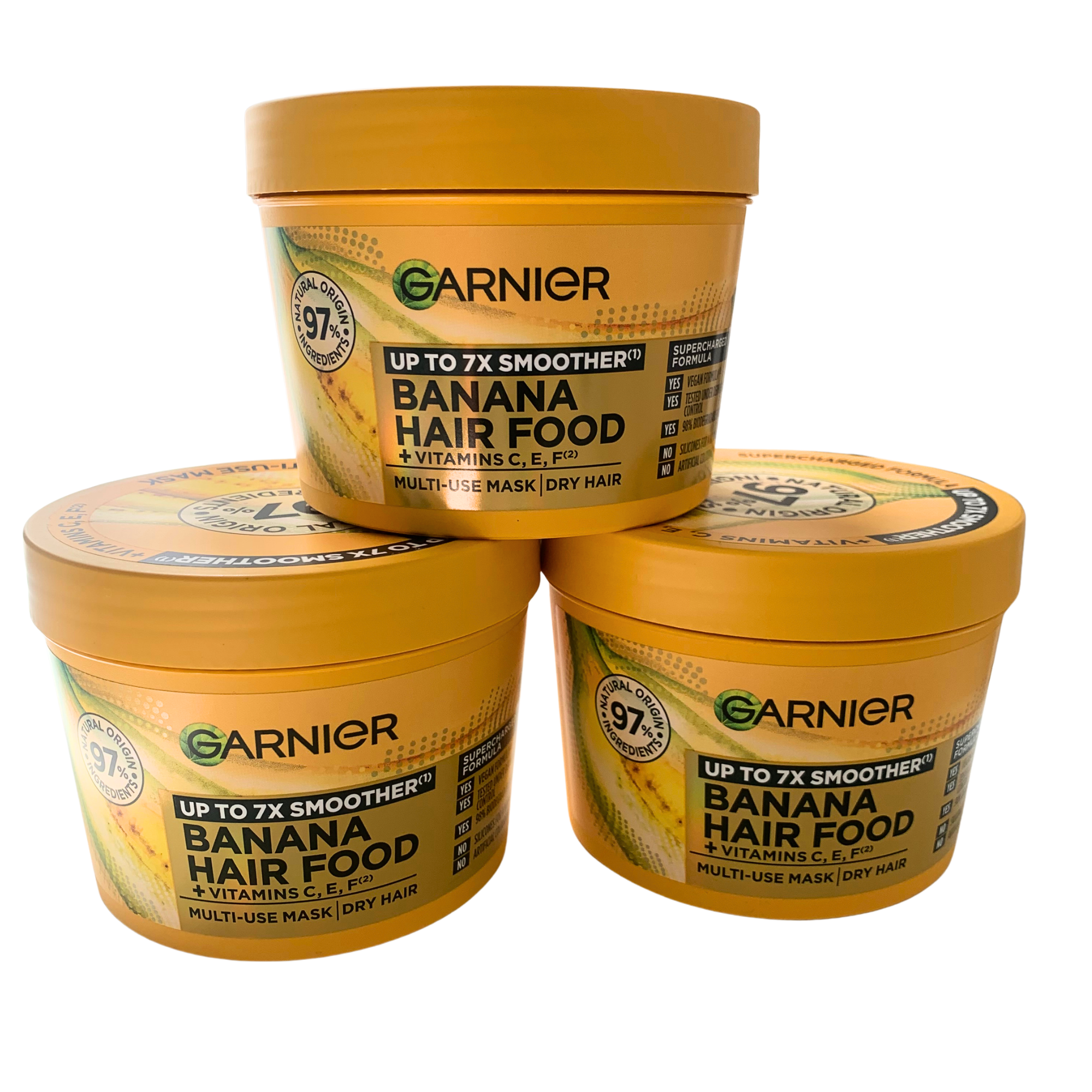 Garnier Banana Hair Food multi-use mask for dry hair with vitamins C, E, and F, up to 7x smoother, 3 x 400ml tubs stacked.